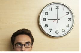 man watching clock