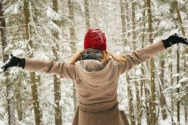 woman in snowy woods