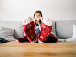 woman wearing reindeer socks